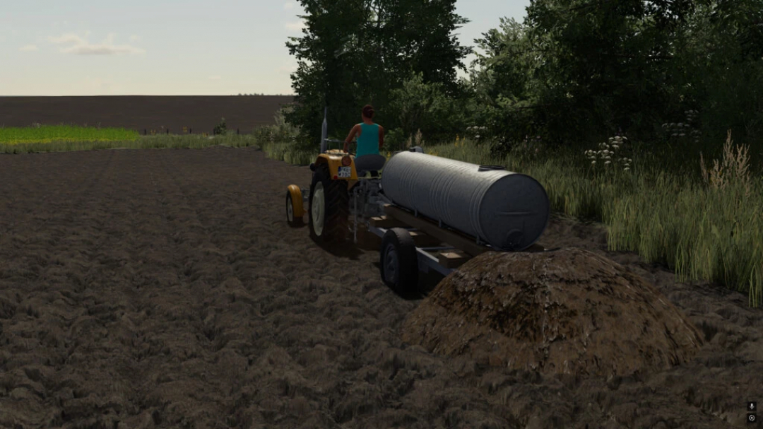 FS22 mod Slurry Barrel v1.0.0.0 shown on a tractor in Farming Simulator 22 field.