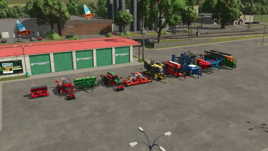 FS25 mods image showing Universal seeders v1.0.0.1 lined up in front of a garage in Farming Simulator 25.