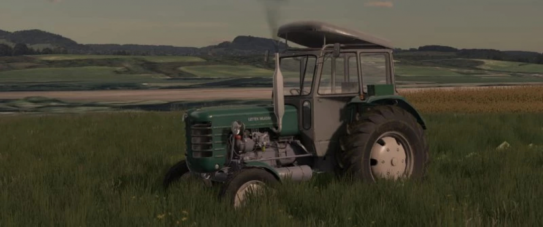 Ursus c-4011 tractor mod for FS22, showcasing vintage design on a green field in Farming Simulator 22.