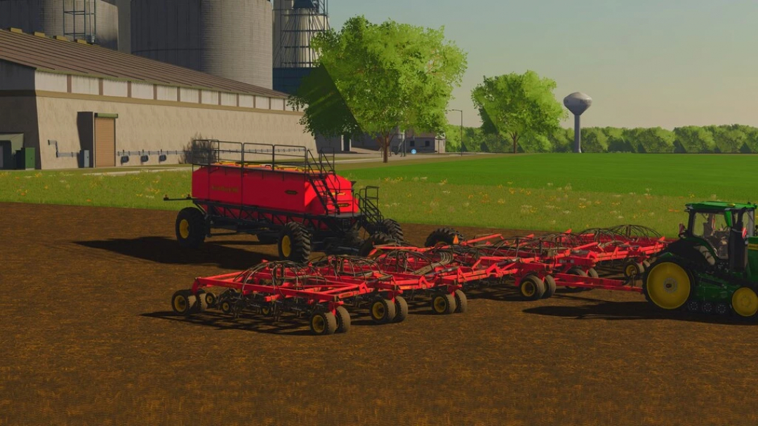 Mod FS22 Vaderstad Seed Hawk 84FT z ciągnikiem na polu w Farming Simulator 22.