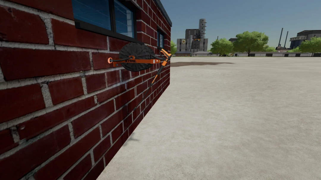 Wall-mounted Stihl high pressure washer mod in FS22 on brick wall.