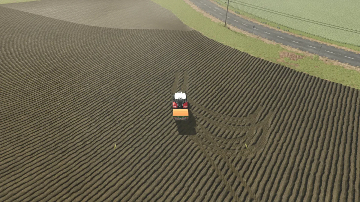 fs25-mods,  Amazone ZA-TS 3200-L mod in FS25 cultivating a vast field near a road.