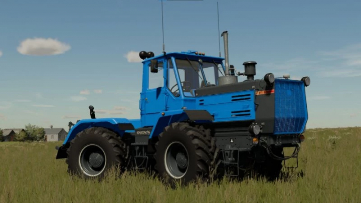 fs22-mods,  Blue HTZ T-150K tractor mod for FS22 in a grassy field, showcasing Farming Simulator 22 mods.