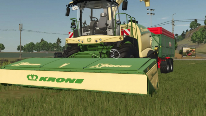 fs25-mods,  Krone XDisc 620 short front hood mod in FS25, showcasing advanced farming equipment in a scenic field.