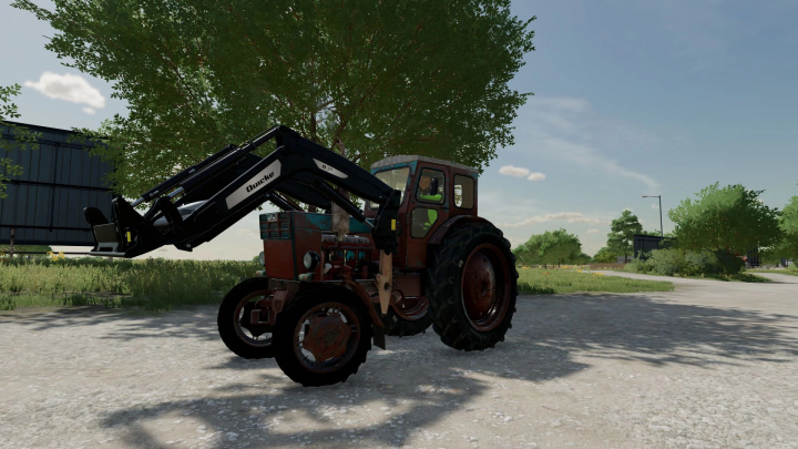 fs22-mods,  FS22 mod LTZ T-40 Old tractor with front loader under a tree in Farming Simulator 22.