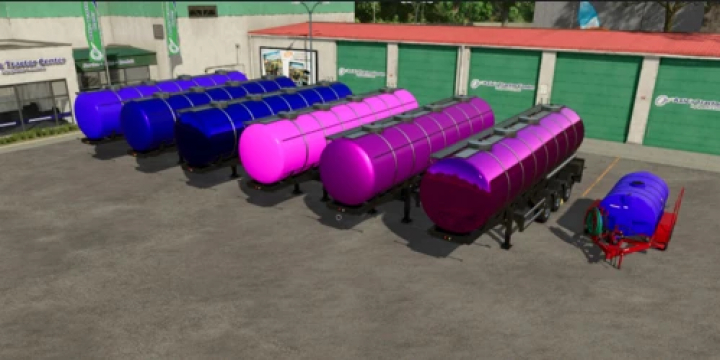 fs25-mods,  Colorful tank trailers in a row, part of Tank trailer v1.0.0.0 mod for Farming Simulator 25.