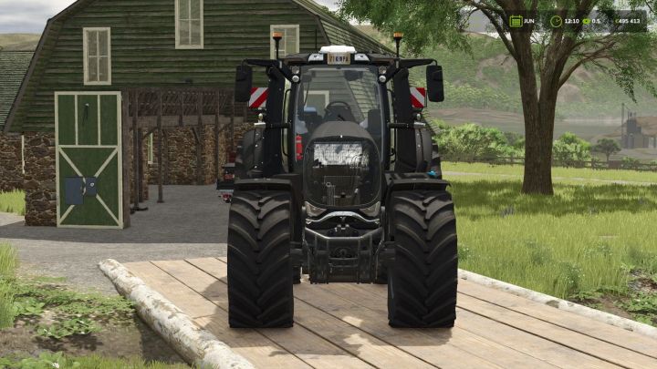 fs25-mods,  Valtra S Turbo Traktor im Farming Simulator 25 Mod, vor einer Scheune an einem sonnigen Tag geparkt.