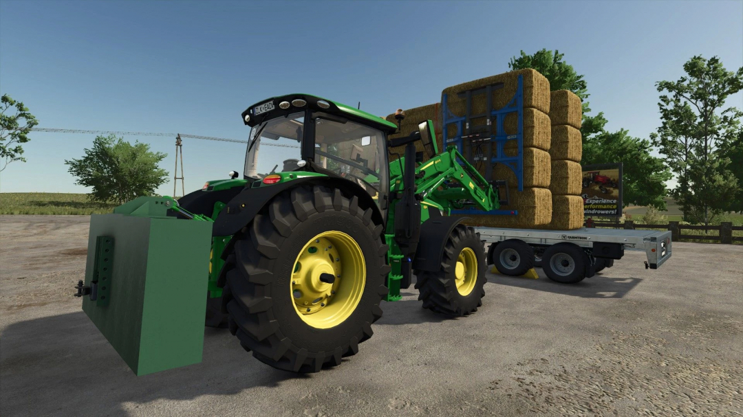 Tractor with Artisanal Weight mod hauling hay bales in FS25