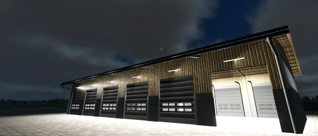 FS25 AustriaModding Drive-through hall at night, with illuminated garage doors.