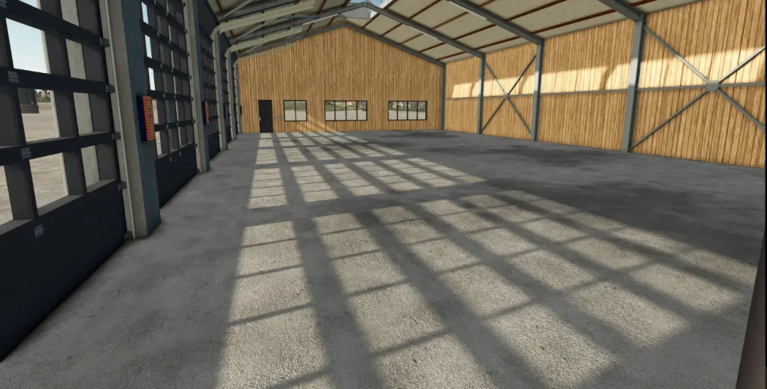 Interior of the Austriamodding Machineshed in FS25, featuring spacious design with large windows and metal framework. Farming Simulator 25 mods.