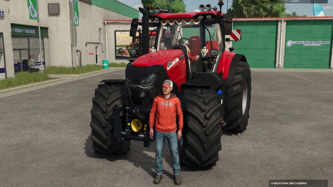 FS25 mod Case IH Puma Edit v1.0.0.0 with a person standing in front of a red tractor in Farming Simulator 25.