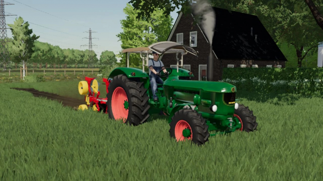 Deutz-Fahr D9005 tractor mod in FS22, rijdend door een grasveld naast een huis.