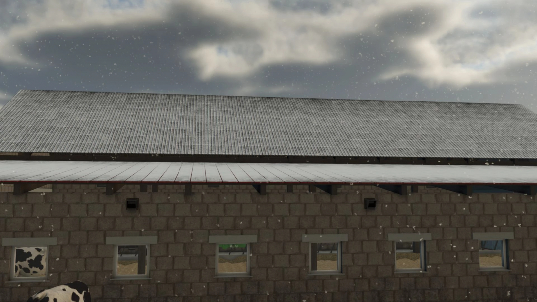 European Style Barn mod in FS25 with snow, showcasing brick exterior and cow detail.