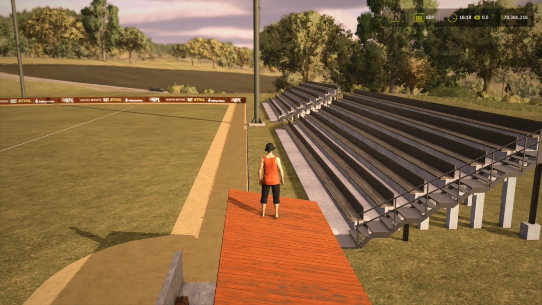 Mod FS25 Bleachers Pack v1.0.0.0 mostrando gradas detalladas junto a un campo en Farming Simulator 25.