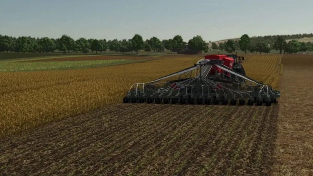 FS25 Tillage textures mod: tractor tilling field with advanced equipment in Farming Simulator 25.