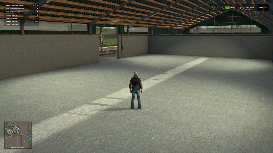 FS25 mods: Player inside a large grain storage building in Farming Simulator 25.