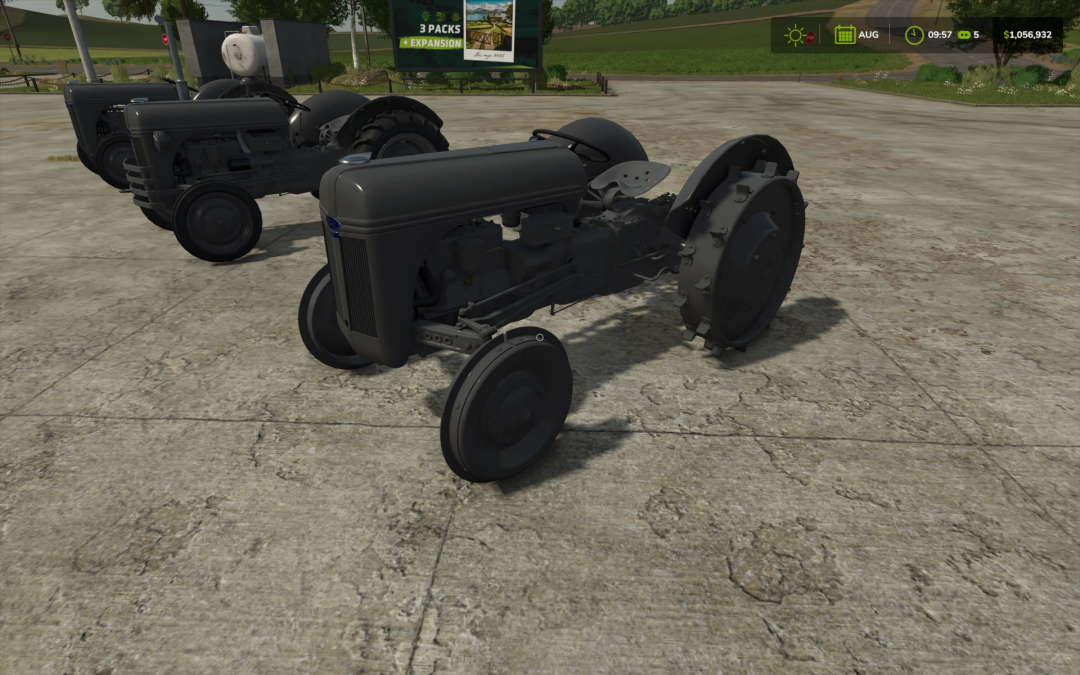 Ford N series tractors mod in FS25, featuring vintage design parked on concrete. Farming Simulator 25 mods improve gameplay realism.