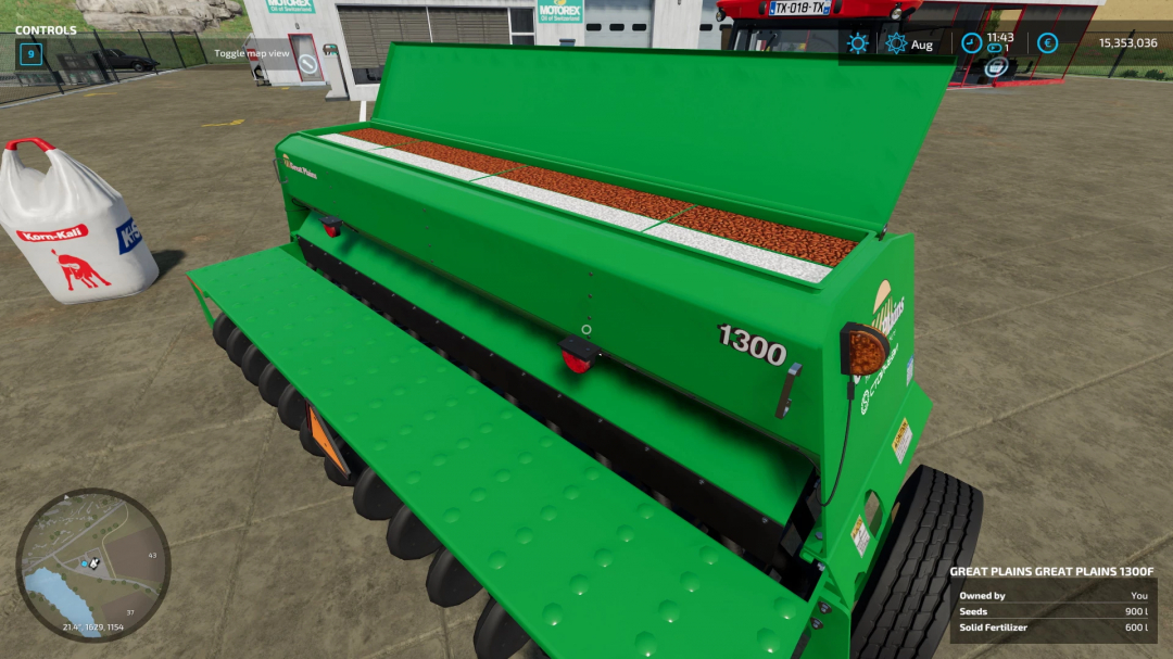 FS22-mod Great Plains 1300F v1.0.0.0 toont een groene zaaimachine met zaden in Farming Simulator 22.