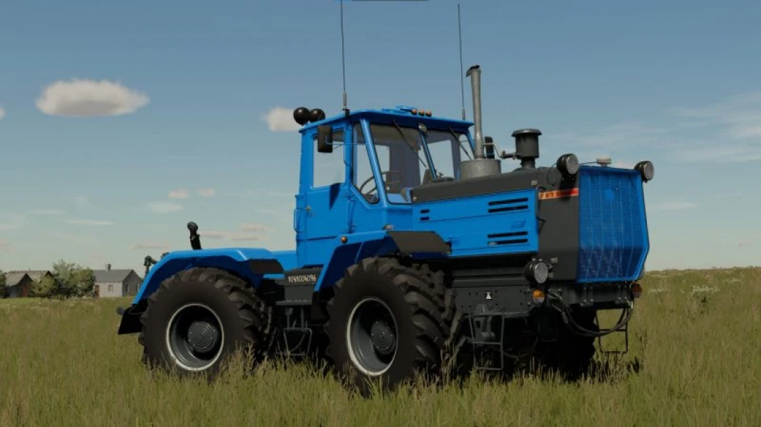 Blue HTZ T-150K tractor mod for FS22 in a grassy field, showcasing Farming Simulator 22 mods.