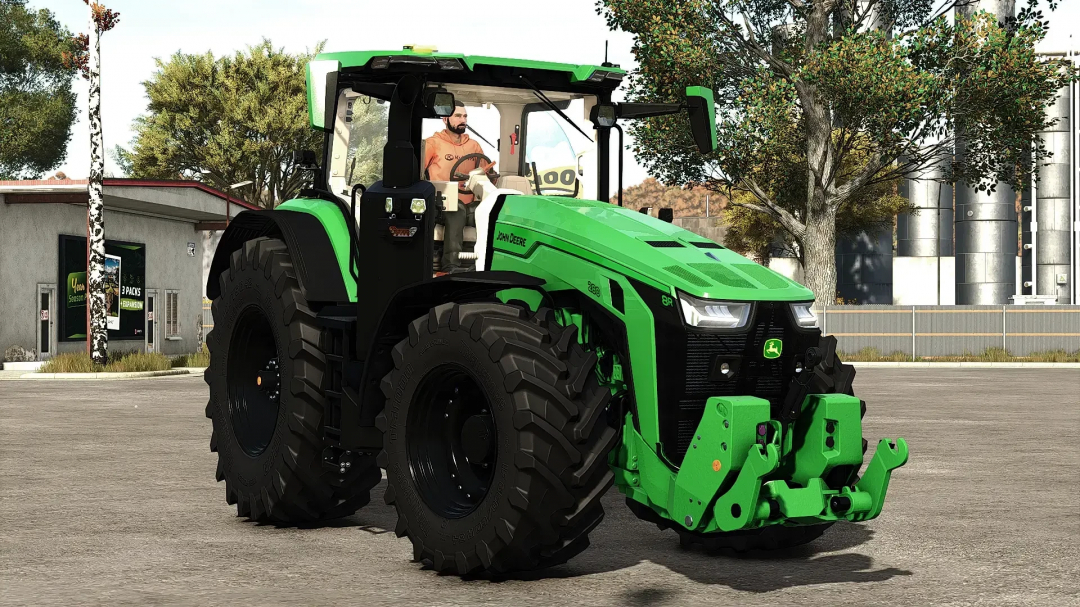 John Deere 8R tractor mod in FS25, showcasing detailed design in a farm setting.