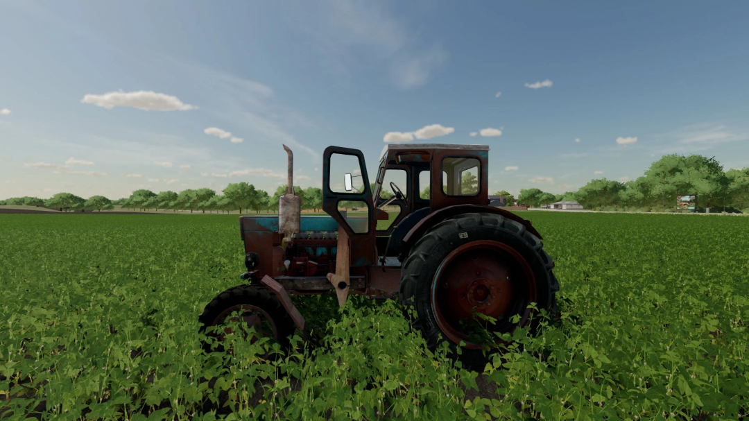 LTZ T-40 tractor in a field, FS22 mod. Farming Simulator 22 mods showcase vintage agricultural equipment.