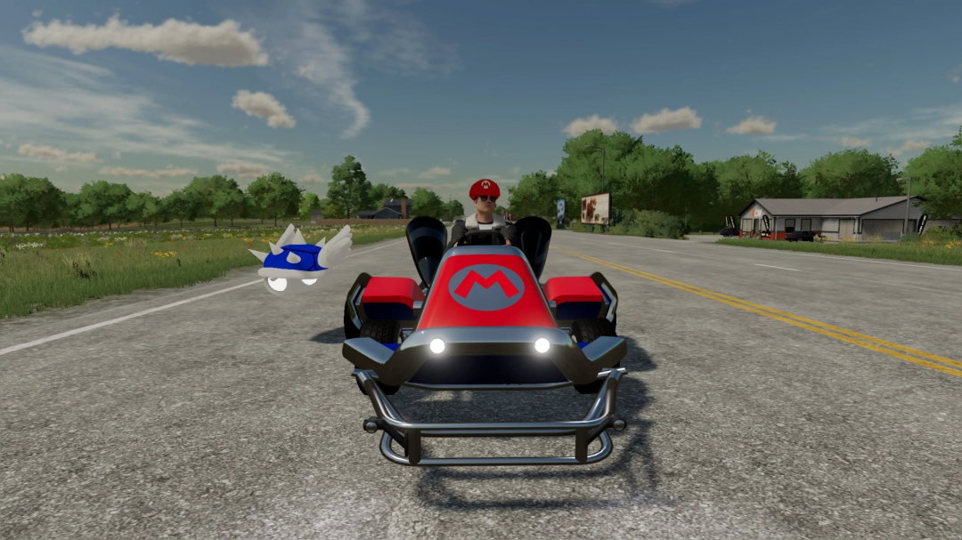 FS22 Mario Kart mod v1.1.0.0 com um kart em uma estrada rural com uma concha azul com espinhos, melhora o jogo no Farming Simulator 22.