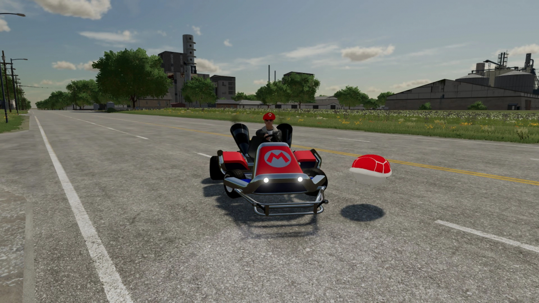 Mod FS22 Mario Kart v1.1.0.0 com um kart na estrada e uma concha vermelha. Mods de Farming Simulator 22 melhoram o jogo.