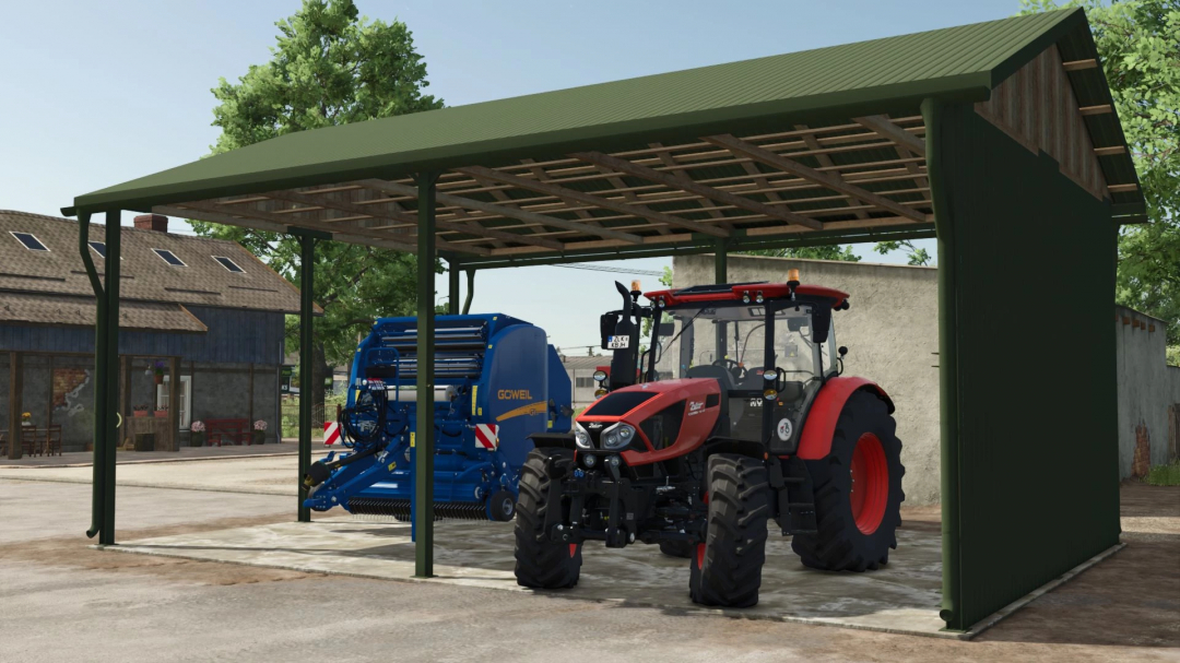 FS25 mod Metal Shed v1.0.0.0: A green metal shed sheltering a red tractor and blue equipment in Farming Simulator 25.