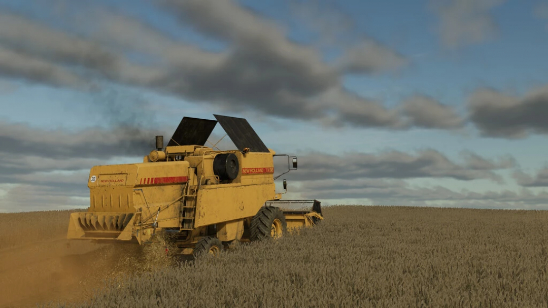 New Holland TX 32 harvester in a wheat field, featured in FS22 mods. Farming Simulator 22 mods enhance gameplay.