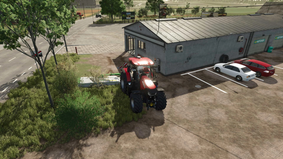 Real Mower v1.0.0.0 mod in FS25: tractor mowing grass near a building.