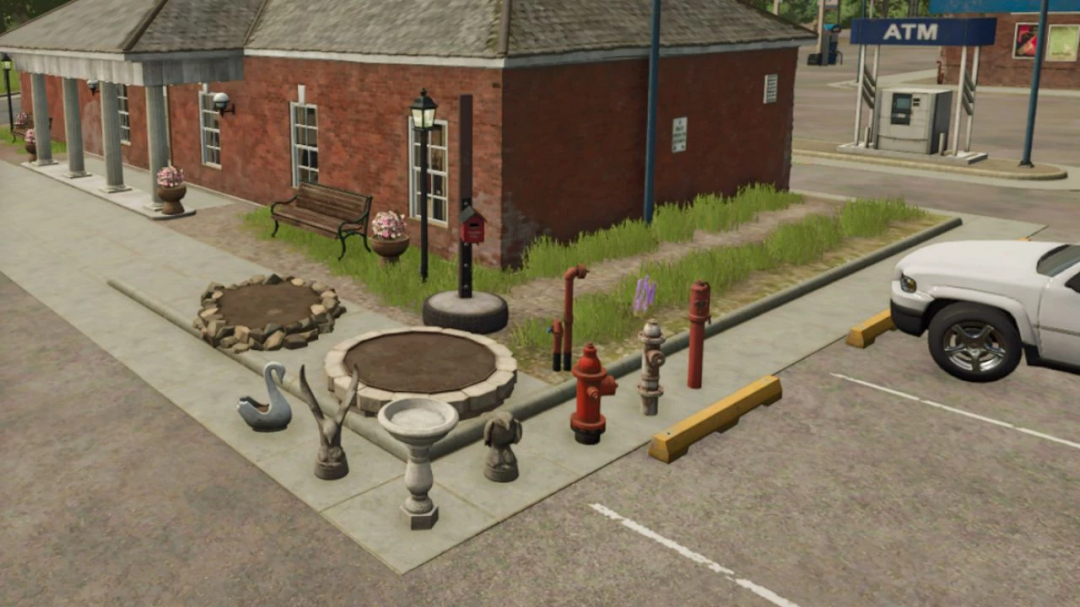 FS25 mod Riverbend Springs Props v1.0.0.0: various decorative objects displayed near a brick building.