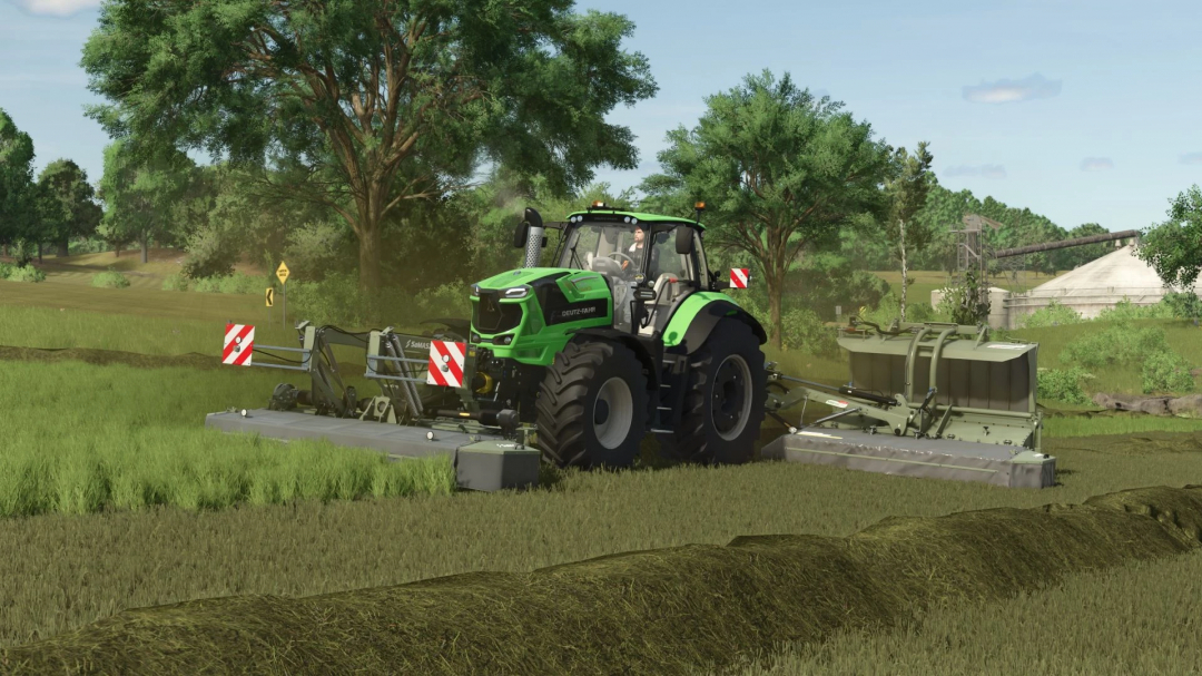 FS25 mod Samasz mowers in action, featuring green tractor on grassy field in Farming Simulator 25.