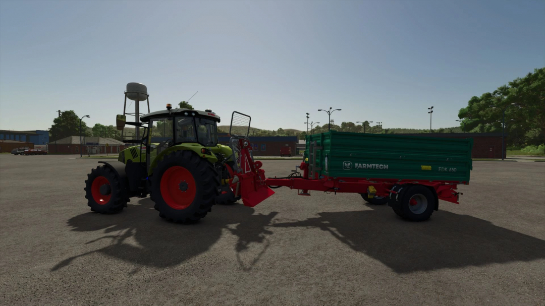 FS25 mod showing tractor with TAJFUN winch and trailer attacher joint in a parking lot.