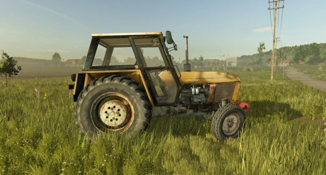 FS25 mod Ursus 920 V1.0.0.0 tractor on a grassy field in Farming Simulator 25.