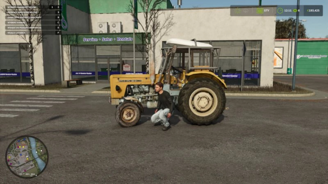 Ursus c-360 tractor mod in FS25 game, positioned near a building with signage. Farming Simulator 25 mods enhance gameplay.