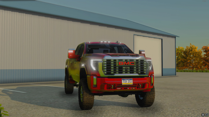 fs22-mods,  2024 GMC Sierra 2500 v3.0.0.0 mod in FS22, showcasing a robust, colorful design in a farmyard setting.