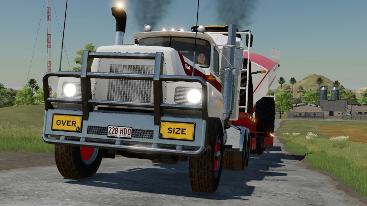 fs25-mods,  FS25 mod image showing Australian Mack R700/Superliner truck with oversize load on a rural road.