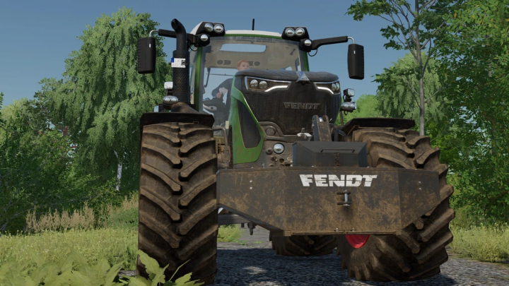 fs22-mods, Farming Simulator 22 mod featuring a Fendt tractor with Avers-Agro Weight Pack. Detailed front view against a lush backdrop.