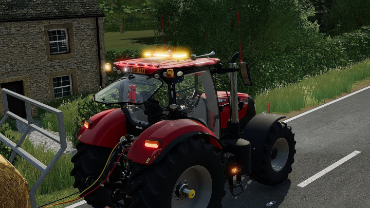 fs22-mods, Case IH Puma tractor mod on a road in FS22, featuring realistic lighting and a countryside setting.