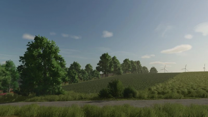 fs25-mods,  Scenic landscape in FS25 Osina Wielka mod with trees and wind turbines.