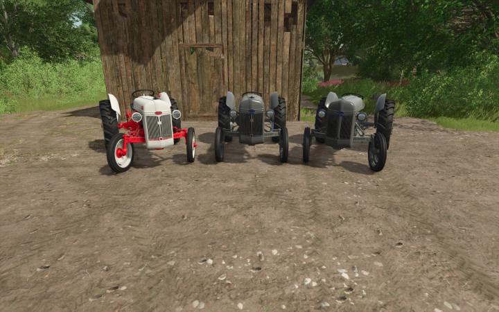 fs25-mods,  Three Ford N series tractors in Farming Simulator 25 mod displayed near a wooden barn.