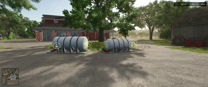 fs25-mods,  FS25 mods: Liquid Fertilizer and Herbicide Storage v1.0.0.0 mod showcasing storage tanks near a farm building in Farming Simulator 25.