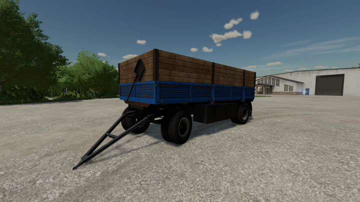 fs22-mods,  Nefaz trailer mod for FS22 in a farmyard setting, showcasing its wood and metal construction.