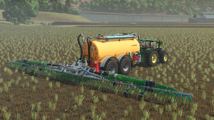 fs25-mods,  Veenhuis Premium Integral 20000 mod in FS25, showcasing a manure spreader in a field with lush greenery.