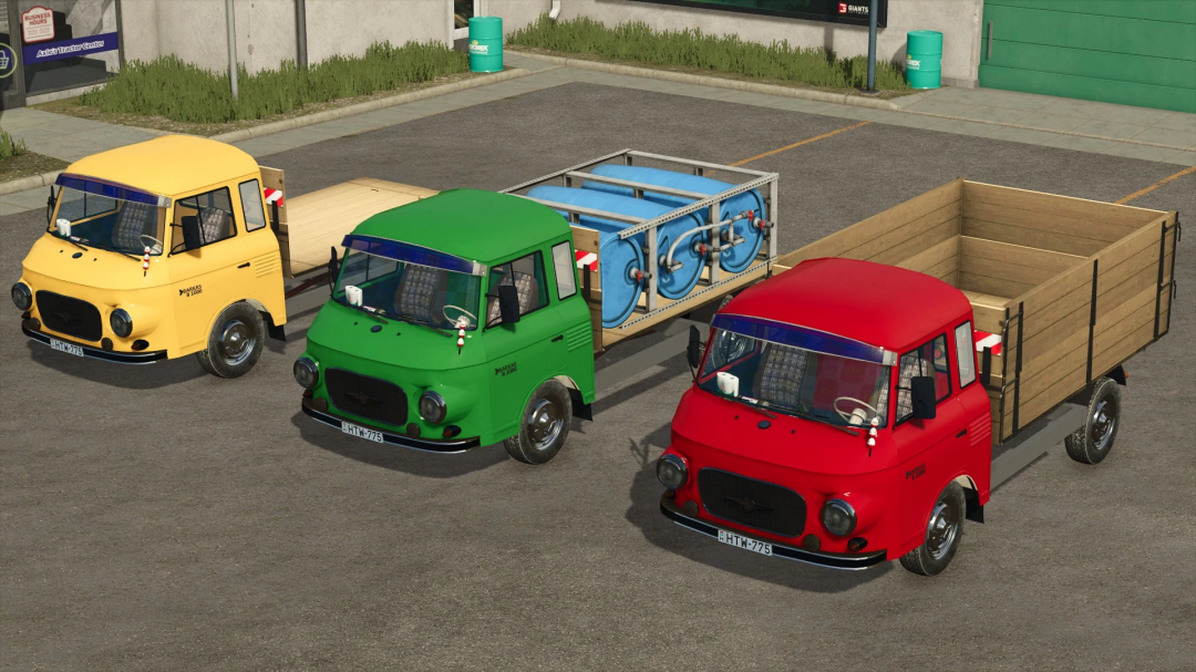 FS25 mods: Barkas B 1000 Multiservice & Livestock Trucks with yellow, green, and red designs in Farming Simulator 25.