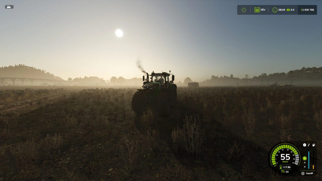 FS25 mod: Tractor emits black smoke on a field at sunset in Farming Simulator 25.