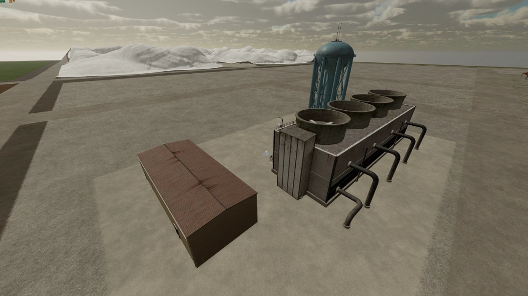 Central water supply mod in FS25 with large tanks and pipes in a snowy landscape.