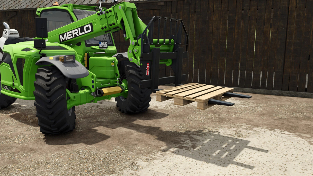 FS25 mod showing a green telehandler lifting an empty pallet v1.0.0.0.