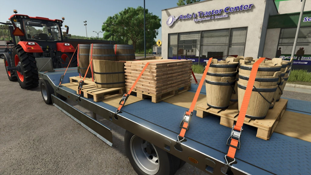 FS25 Dirt Cheap Pallets mod showing barrels and planks on a trailer outside Axle's Tractor Center.