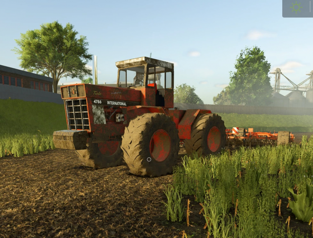 FS25 International Series 1486 tractor in a field, Farming Simulator 25 mod.